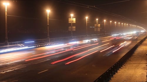 Night Time Lapse of Highway Traffic Streaks