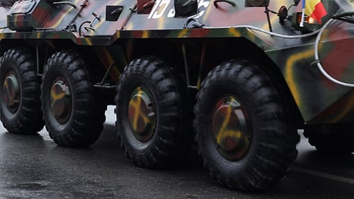 Camoflaged Armored Vehicle Moving Forward