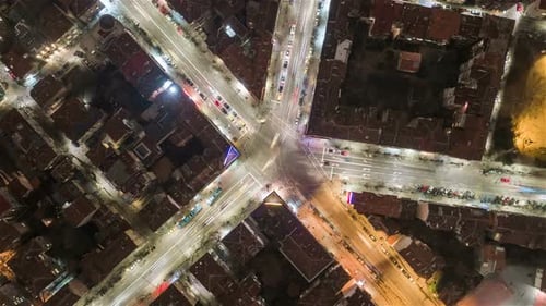 Aerial View of City Intersection at Night