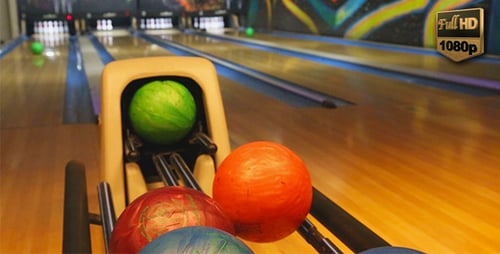 Bowling Balls Waiting for Bowlers in Alley