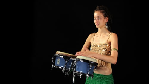 Young Woman Playing Bongos in Mid Shot