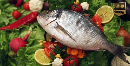 Close Up of Silver Fish Garnished with Vegetables