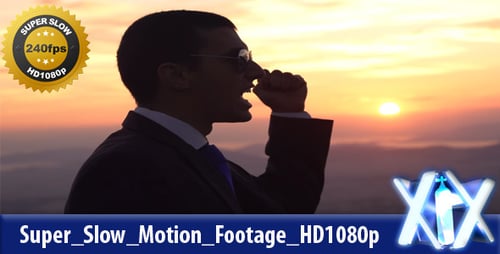 Man Silhouette Raises Fist and Yells at Sunset