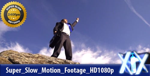 Man in Suit Reaches Mountain Top