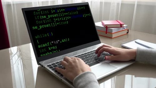 Source code on the monitor screen.