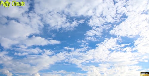 Clouds Moving Slowly Across a Blue Sky