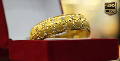 Gold Bangle with Stones in Red Velvet Box