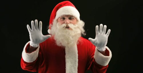 Santa Claus Dancing in Red Suit and Hat