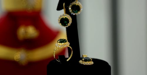 Gold Ring and Earrings with Emerald Gemstones