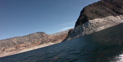 Lake View with Rugged Mountains and Rippling Water