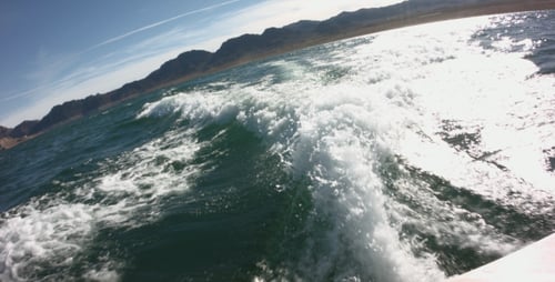 Water View from Fast Moving Boat on Lake