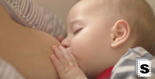 Baby Breastfeeding Calmly Close Up Indoors
