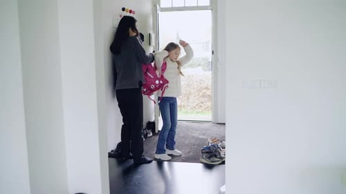 Girl leaving to school