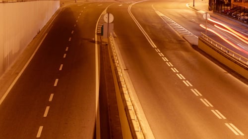 Cars Create Light Streaks on City Road Time Lapse