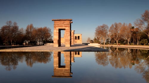 Temple of Debod reflected in water in Madrid