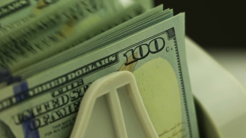 Money Counters and 100-USD Banknotes