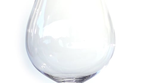 Close Up Dark Red Wine Pouring in Glass