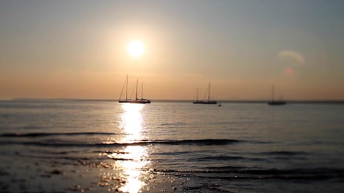 Golden Light and Boats on the Ocean