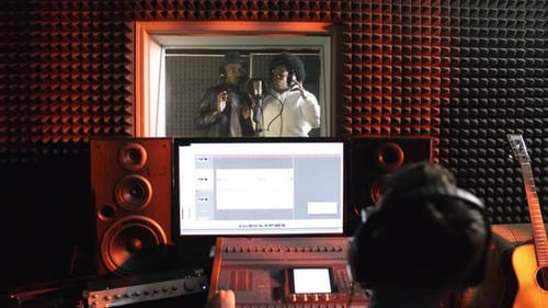 Singers Recording Song in Studio