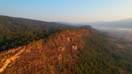 4K Aerial view over beautiful mountains. beautiful sunset over high mountains