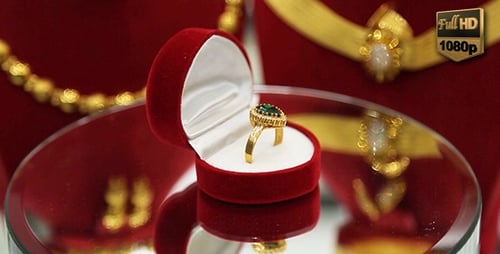 Close Up of Emerald Ring in Red Box