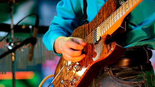 Man Playing Guitar