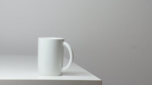 Pouring Water Into Mug