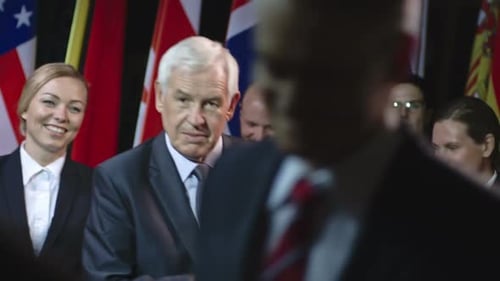 Politicians shake hands after diplomatic meeting