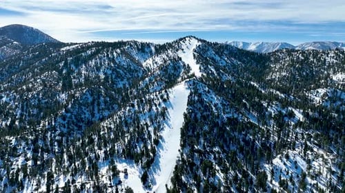Aerial View of Mountain Ski Resort with Beautiful Winter Landscape