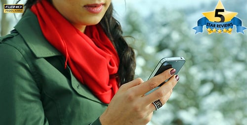 Woman Using Phone in Winter Outdoor Scene