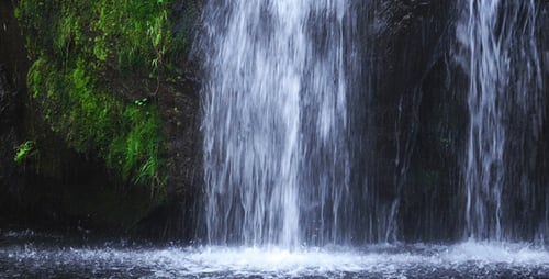 Waterfall and Mossy Rocks