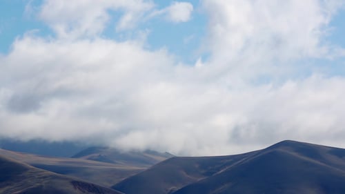 Mountains and Clouds in a Vast Landscape