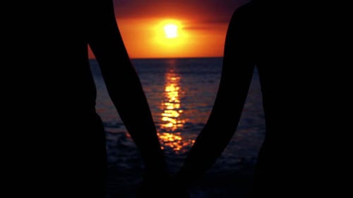 Romantic Couple At Beach During Sunset 1
