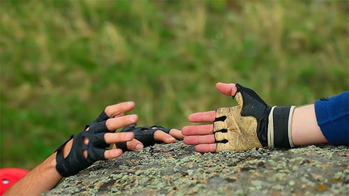 Helping Hand During Rock Climbing Adventure