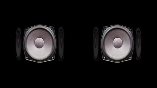 Rotating Audio Speakers on Black Background