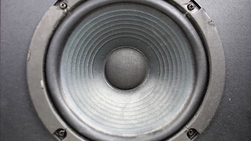 Speaker Moving In And Out Close Up Shot