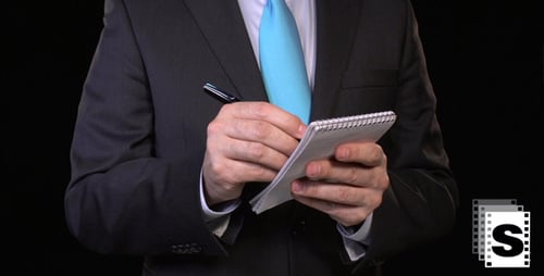 Geschäftsmann macht sich Notizen