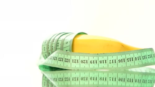 Yellow Banana Wrapped in a Measuring Tape