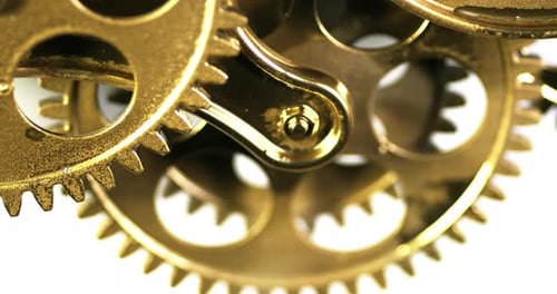 Golden Gears Turning in a Mechanical Device