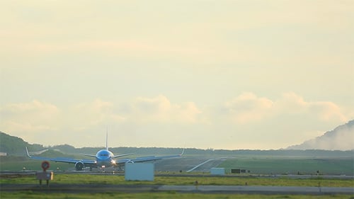 Airplane Landing at Golden Hour