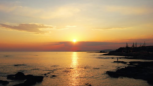 Sunset With Clouds Over Sea