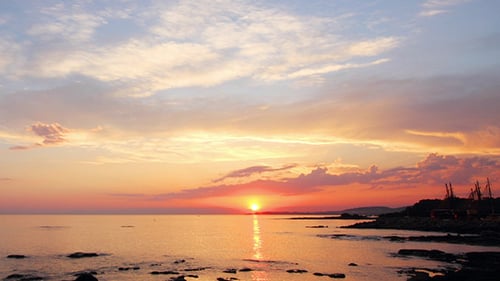 Sunset With Clouds Over Sea