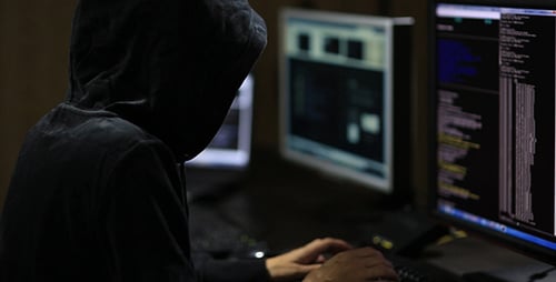 Hacker in Hood Typing on Keyboard 2