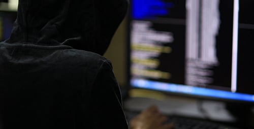 Hacker in Hood Typing on Keyboard 5