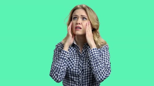 Blonde Woman Experiencing Headache Pain, Studio Shot
