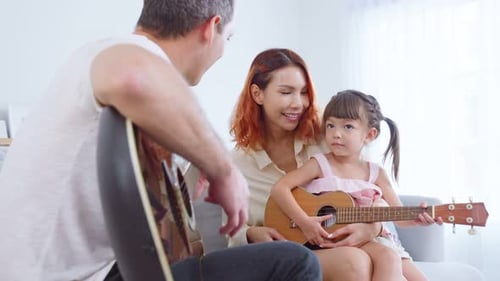 Family Playing Music Together at Home