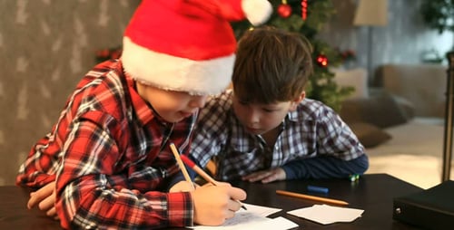 Children Writing Letters to Santa at Christmas Time
