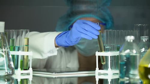 Lab Assistant Analyzing Urine in Tube, Healthcare Checkup, Illness Prevention