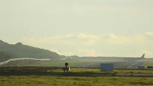 Airplane on Runway at Airport During the Day