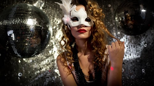 Glamorous Woman Posing with Disco Balls